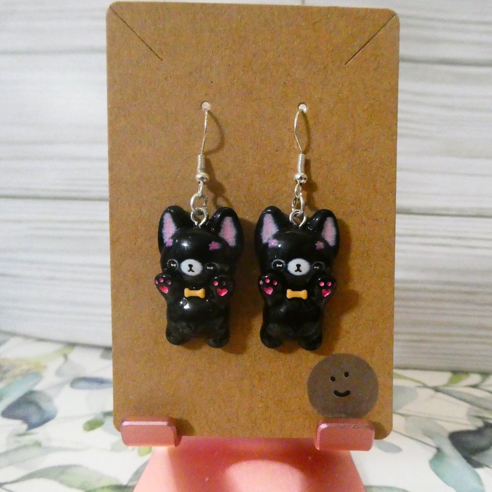 Fish Hook black puppies earrings.